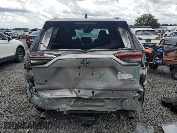 2021 Toyota RAV4 Hybrid XSE with VIN 2T3E6RFVXMW020561, listed as a Copart auction lot 64822005 with 39,434 mi miles and Salvage title. Bid and sale history available at DreamBid. Image 6.