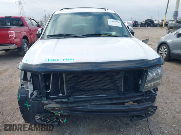 2013 Chevrolet Suburban LT with VIN 1GNSKJE79DR328718, listed as a IAAI auction lot 42005926 with 168,610 mi miles and . Bid and sale history available at DreamBid. Image 13.