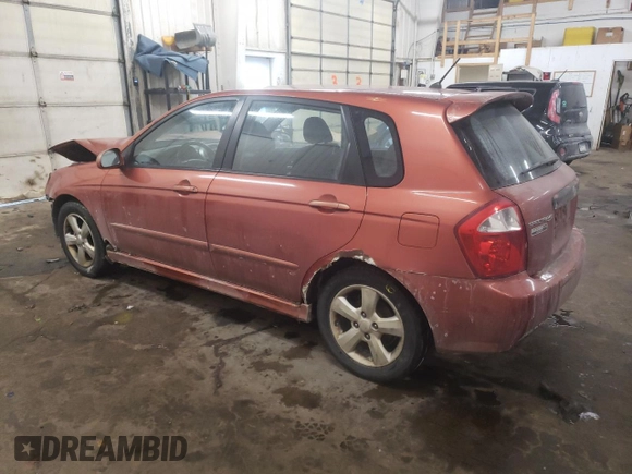 2009 Kia Spectra with VIN KNAFE241995025583, listed as a Copart auction lot 45626095 with 297,361 mi miles and Salvage Title. Bid and sale history available at carsss.com. Image 2.