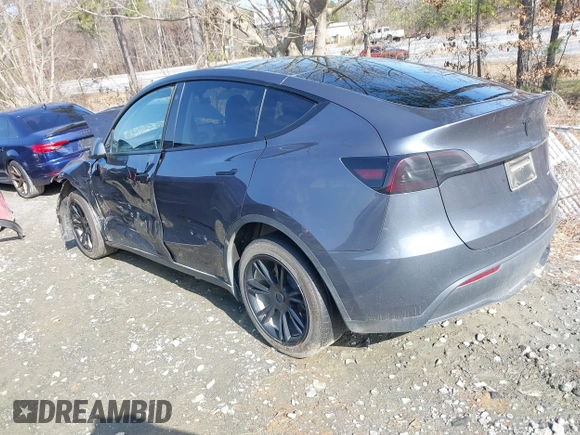 2023 Tesla Model Y Long Range with VIN 7SAYGDEE1PA053215, listed as a IAAI auction lot 41476973 with 58,025 mi miles and . Bid and sale history available at DreamBid. Image 3.