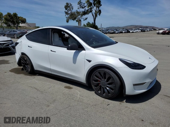 2022 Tesla Model Y Performance z VIN 7SAYGDEF6NF397082, wystawiony jako Copart lot #55823435 z przebiegiem Nie podano mil oraz Szkoda całkowita • Salvage title. Historia ofert i sprzedaży dostępna na DreamBid. Obrazek 4.