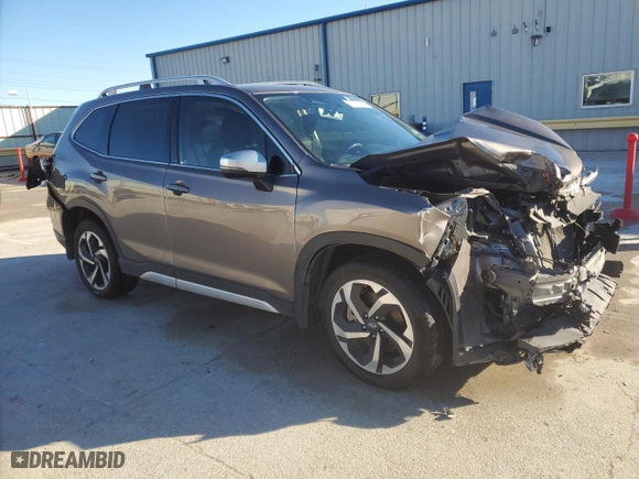 2022 Subaru Forester Touring with VIN JF2SKARC5NH508433, listed as a Copart auction lot 87021984 with 55,425 mi miles and Salvage Title. Bid and sale history available at carsss.com. Image 4.