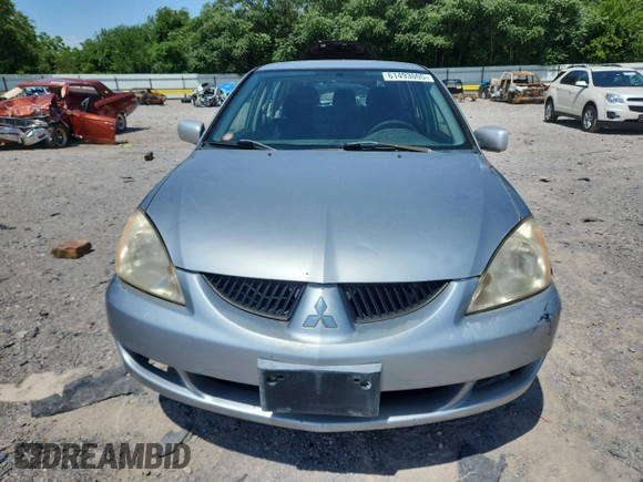 2004 Mitsubishi Lancer z VIN JA3AD29F34U045488, wystawiony jako Copart lot #61493005 z przebiegiem 230 611 mil mil oraz Czysty tytuł • Clean title. Historia ofert i sprzedaży dostępna na DreamBid. Obrazek 5.