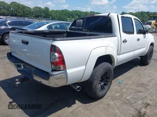 2015 Toyota Tacoma with VIN 3TMLU4EN1FM195626, listed as a IAAI auction lot 42571649 with 135,699 mi miles and . Bid and sale history available at DreamBid. Image 4.