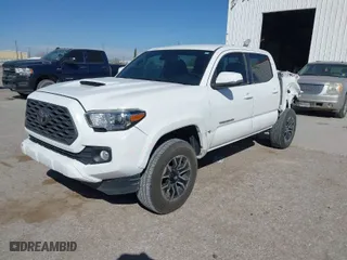 2020 Toyota Tacoma 4WD SR5 with VIN 3TMCZ5AN0LM350742, listed as a IAAI auction lot 41813786 with 84,109 mi miles. Bid and sale history available at carsss.com. Image 2.