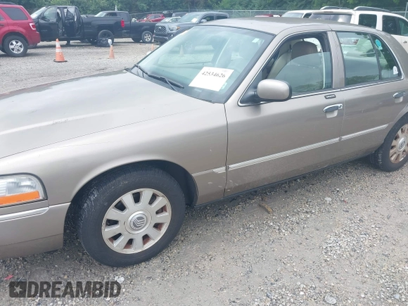 2005 Mercury Grand Marquis LS Premium z VIN 2MEFM75W25X661590, wystawiony jako IAAI lot #42534626 z przebiegiem 113 450 mil mil oraz . Historia ofert i sprzedaży dostępna na DreamBid. Obrazek 6.