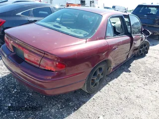 2001 Buick Regal LS with VIN 2G4WB55K711287284, listed as a IAAI auction lot 42524662 with Not provided miles and . Bid and sale history available at DreamBid. Image 4.