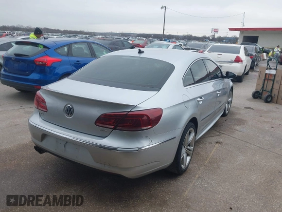2014 Volkswagen CC Sport with VIN WVWBN7ANXEE501758, listed as a IAAI auction lot 41443518 with 193,259 mi miles and . Bid and sale history available at DreamBid. Image 4.