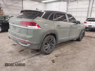 2022 Volkswagen Atlas SE with VIN 1V2KC2CA3NC207745, listed as a IAAI auction lot 41588761 with 99,206 mi miles and . Bid and sale history available at DreamBid. Image 4.