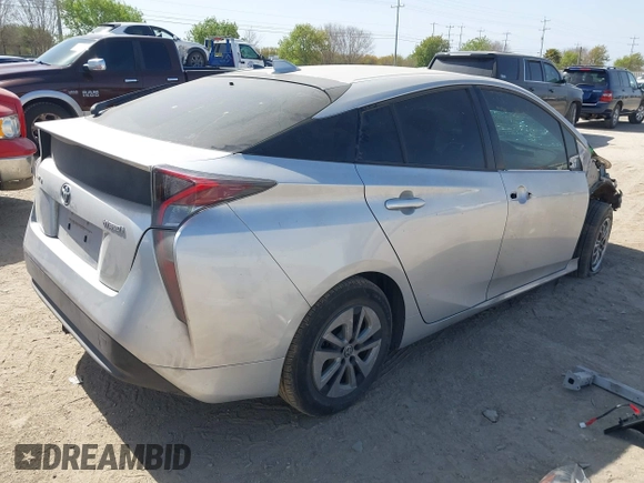 2017 Toyota Prius Two with VIN JTDKARFU9H3037028, listed as a IAAI auction lot 41808283 with 147,617 mi miles. Bid and sale history available at carsss.com. Image 4.