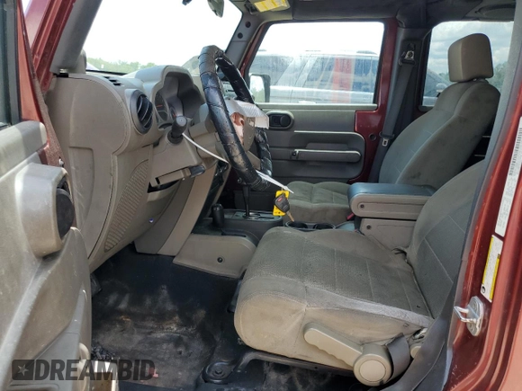 2007 Jeep Wrangler Unlimited Sahara with VIN 1J4GA591X7L118192, listed as a Copart auction lot 62357885 with 261,019 mi miles and Clean title. Bid and sale history available at DreamBid. Image 7.