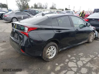 2019 Toyota Prius L Eco with VIN JTDKARFU6K3074058, listed as a IAAI auction lot 41741499 with 70,834 mi miles. Bid and sale history available at carsss.com. Image 4.