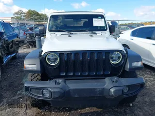 2021 Jeep Wrangler Sport S with VIN 1C4HJXAG0MW757133, listed as a IAAI auction lot 41028980 with 53,165 mi miles and . Bid and sale history available at DreamBid. Image 12.