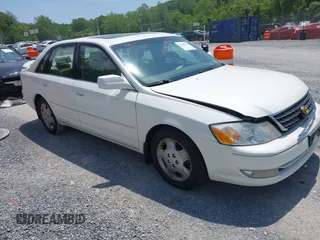 2003 Toyota Avalon XL z VIN 4T1BF28B43U271225, wystawiony jako IAAI lot #42309312 z przebiegiem 213 589 mil mil oraz . Historia ofert i sprzedaży dostępna na DreamBid. Obrazek 1.