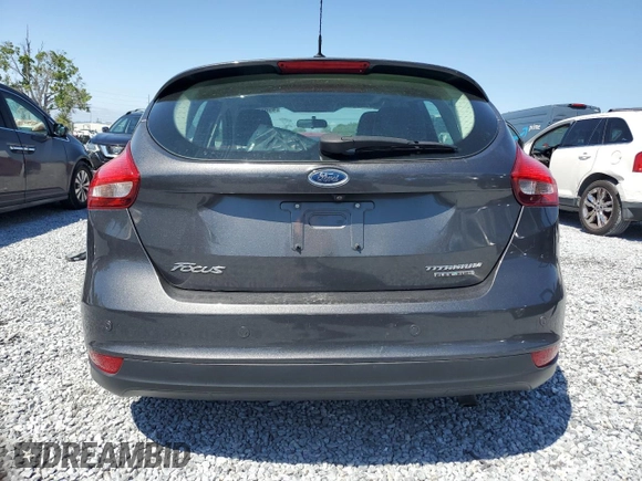 2015 Ford Focus Titanium with VIN 1FADP3N24FL260486, listed as a Copart auction lot 49856865 with Not provided miles and Clean title. Bid and sale history available at DreamBid. Image 6.