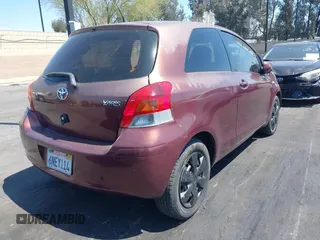 2010 Toyota Yaris with VIN JTDJT4K38A5324103, listed as a IAAI auction lot 41964619 with 149,874 mi miles. Bid and sale history available at carsss.com. Image 4.