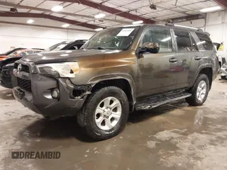 2019 Toyota 4Runner SR5 with VIN JTEBU5JR7K5672873, listed as a IAAI auction lot 41932510 with 122,894 mi miles and . Bid and sale history available at DreamBid. Image 2.