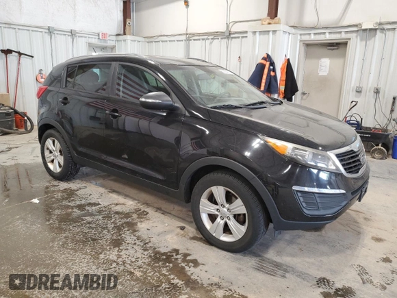 2012 Kia Sportage LX z VIN KNDPB3A24C7179584, wystawiony jako Copart lot #60938465 z przebiegiem 161 362 mil mil oraz Czysty tytuł • Clean title. Historia ofert i sprzedaży dostępna na DreamBid. Obrazek 4.