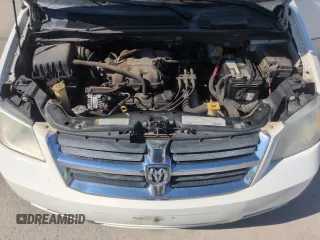 2010 Dodge Grand Caravan SXT with VIN 2D4RN5D16AR444938, listed as a Copart auction lot 56762695 with 251,437 mi miles and Clean Title. Bid and sale history available at DreamBid. Image 12.