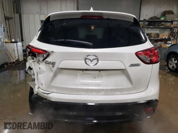 2014 Mazda CX-5 Grand Touring with VIN JM3KE4DY7E0417308, listed as a Copart auction lot 88161195 with 107,493 mi miles and Salvage Title. Bid and sale history available at carsss.com. Image 6.