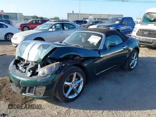 2008 Saturn Sky Red Line with VIN 1G8MF35X58Y118317, listed as a IAAI auction lot 41944739 with 106,223 mi miles. Bid and sale history available at carsss.com. Image 2.