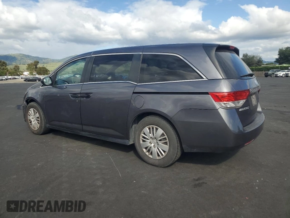 2015 Honda Odyssey LX with VIN 5FNRL5H27FB018491, listed as a Copart auction lot 54888445 with 129,488 mi miles and Salvage Title. Bid and sale history available at DreamBid. Image 2.