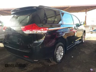 2012 Toyota Sienna XLE AAS with VIN 5TDYK3DC6CS263128, listed as a IAAI auction lot 41583798 with 114,820 mi miles. Bid and sale history available at carsss.com. Image 4.