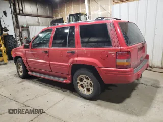 1996 Jeep Grand Cherokee Limited with VIN 1J4GZ78Y3TC186413, listed as a Copart auction lot 82370854 with 261,630 mi miles and Salvage Title. Bid and sale history available at carsss.com. Image 2.