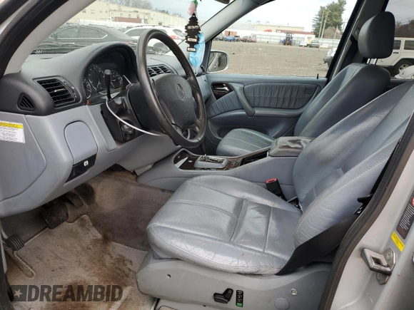 2005 Mercedes-Benz M 500 with VIN 4JGAB75E65A532359, listed as a Copart auction lot 41510825 with 139,916 mi miles and Salvage title. Bid and sale history available at DreamBid. Image 7.