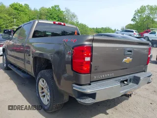 2015 Chevrolet Silverado 1500 LT with VIN 1GCUKREC8FF201315, listed as a IAAI auction lot 42250910 with 137,736 mi miles and . Bid and sale history available at DreamBid. Image 3.