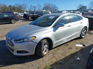2016 Ford Fusion Titanium Hybrid with VIN 3FA6P0RU7GR364573, listed as a IAAI auction lot 41298298 with 189,900 mi miles. Bid and sale history available at carsss.com. Image 17.