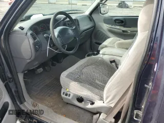1999 Ford F-150 XL with VIN 1FTRX17L6XNB12078, listed as a Copart auction lot 79332914 with 168,591 mi miles and Salvage Title. Bid and sale history available at carsss.com. Image 7.