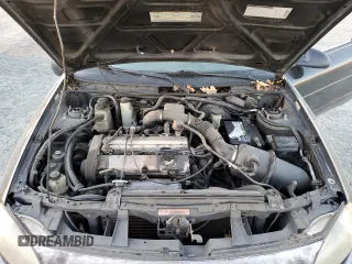 1998 Ford Escort z VIN 3FALP1131WR101490, wystawiony jako Copart lot #74065584 z przebiegiem 144 659 mil mil oraz Szkoda całkowita • Salvage title. Historia ofert i sprzedaży dostępna na DreamBid. Obrazek 11.