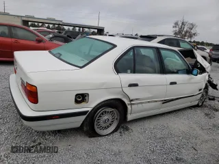 1995 BMW 5 Series 525i z VIN WBAHD6326SGK83552, wystawiony jako Copart lot #45245825 z przebiegiem 181 607 mil mil oraz Szkoda całkowita • Salvage title. Historia ofert i sprzedaży dostępna na DreamBid. Obrazek 3.
