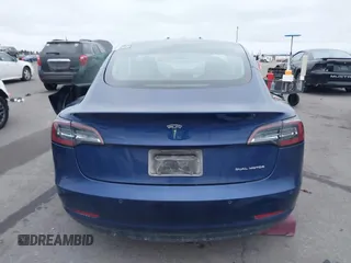 2021 Tesla Model 3 Long Range with VIN 5YJ3E1EB8MF848049, listed as a IAAI auction lot 40974331 with 61,462 mi miles. Bid and sale history available at carsss.com. Image 16.