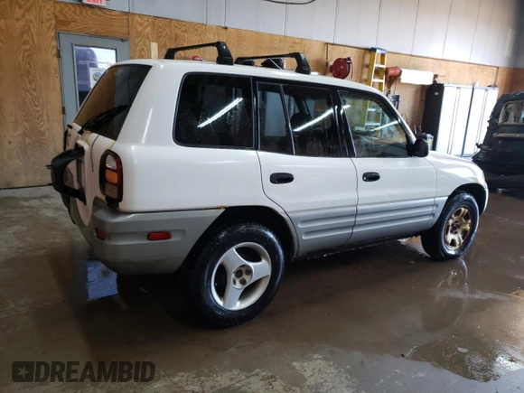 2000 Toyota RAV4 z VIN JT3GP10V5Y0049271, wystawiony jako Copart lot #56158045 z przebiegiem 188 900 mil mil oraz Czysty tytuł • Clean title. Historia ofert i sprzedaży dostępna na DreamBid. Obrazek 3.