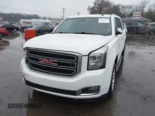 2015 GMC Yukon XL SLT with VIN 1GKS1HKC7FR223513, listed as a IAAI auction lot 40822575 with 128,239 mi miles. Bid and sale history available at carsss.com. Image 17.