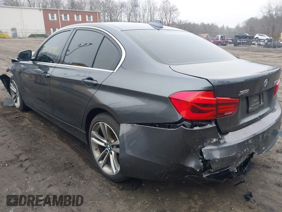 2018 BMW 3 Series with VIN WBA8F1C54JAE93207, listed as a IAAI auction lot 41876781 with 64,749 mi miles and . Bid and sale history available at DreamBid. Image 3.