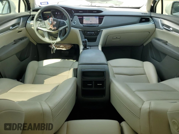2023 Cadillac XT5 FWD Premium Luxury with VIN 1GYKNCRS7PZ150378, listed as a Copart auction lot 71792184 with 21,631 mi miles and Salvage Title. Bid and sale history available at carsss.com. Image 8.
