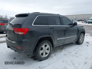 2011 Jeep Grand Cherokee 70th Anniversary with VIN 1J4RR4GG4BC519507, listed as a IAAI auction lot 41537091 with 175,967 mi miles. Bid and sale history available at carsss.com. Image 4.