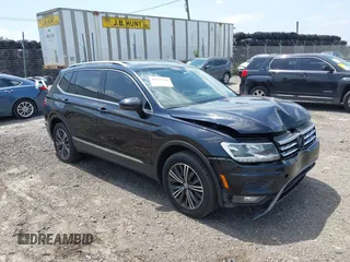 2019 Volkswagen Tiguan SE with VIN 3VV2B7AX6KM007401, listed as a IAAI auction lot 42577918 with 195,448 mi miles and . Bid and sale history available at DreamBid. Image 1.