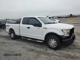 2015 Ford F-150 XLT with VIN 1FTFX1EF9FFA42214, listed as a Copart auction lot 56384325 with 121,911 mi miles and Salvage title. Bid and sale history available at DreamBid. Image 4.