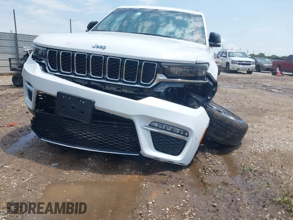 2023 Jeep Grand Cherokee with VIN 1C4RJYB63PC649000, listed as a IAAI auction lot 42306975 with 29,948 mi miles and . Bid and sale history available at DreamBid. Image 6.
