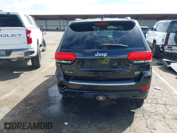 2014 Jeep Grand Cherokee Overland with VIN 1C4RJFCT8EC106005, listed as a IAAI auction lot 41989721 with 148,469 mi miles and . Bid and sale history available at DreamBid. Image 17.