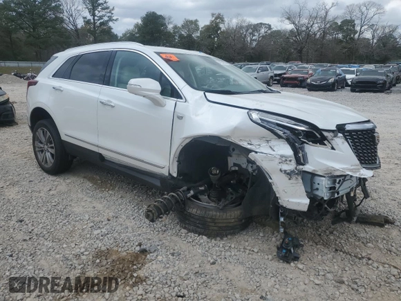 2022 Cadillac XT5 FWD Premium Luxury z VIN 1GYKNCRS5NZ174787, wystawiony jako Copart lot #47541075 z przebiegiem 31 357 mil mil oraz Szkoda całkowita • Salvage title. Historia ofert i sprzedaży dostępna na DreamBid. Obrazek 4.