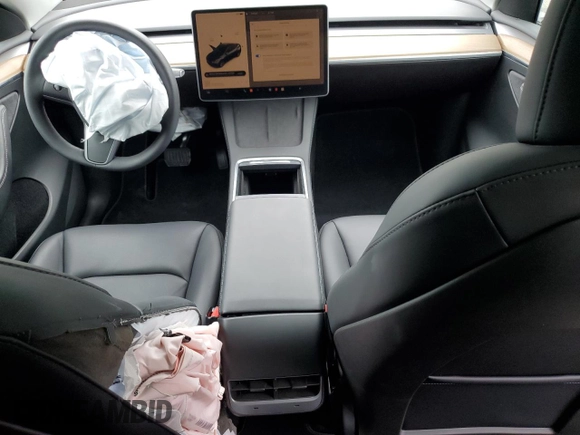 2024 Tesla Model Y с VIN 7SAYGDED2RF040079, выставлен на аукционе Copart как лот 61415675 с пробегом 2 549 миль миль и На запчасти • Non repairable. История ставок и продаж доступна на DreamBid. Изображение 8.