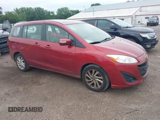 2015 Mazda 5 Sport with VIN JM1CW2BL3F0184325, listed as a IAAI auction lot 42597709 with 169,619 mi miles and . Bid and sale history available at DreamBid. Image 1.
