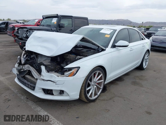 2015 Audi A6 2.0T Premium Plus with VIN WAUGFAFC7FN010019, listed as a IAAI auction lot 42033638 with 1 mi miles. Bid and sale history available at carsss.com. Image 2.
