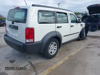 2008 Dodge Nitro SXT z VIN 1D8GT28K98W113494, wystawiony jako IAAI lot #41728030 z przebiegiem 31 397 mil mil oraz . Historia ofert i sprzedaży dostępna na DreamBid. Obrazek 4.