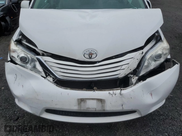 2015 Toyota Sienna LE with VIN 5TDJK3DCXFS126604, listed as a Copart auction lot 56987355 with 102,079 mi miles and Salvage title. Bid and sale history available at DreamBid. Image 12.
